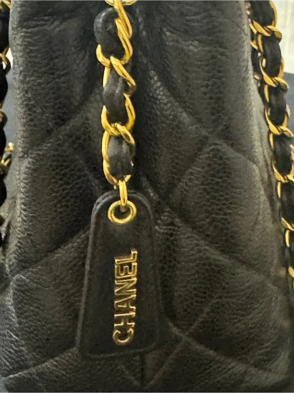 CHANEL VINTAGE Black Quilted Leather Shoulder Bag with 24K GP Chain.